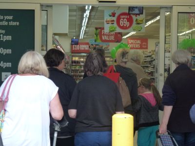First customers enter new Budgens store